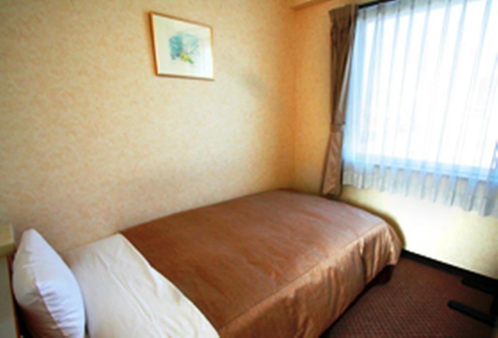 Star Hotel Koriyama Rum bild